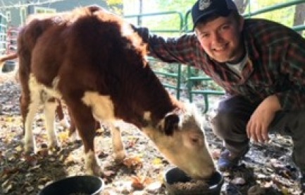 Lachlan with one of the calves we raised