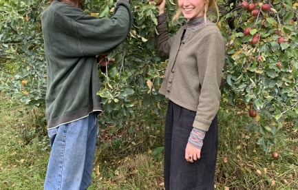 Andy and Via harvesting apples at Lost Nation Orchard.