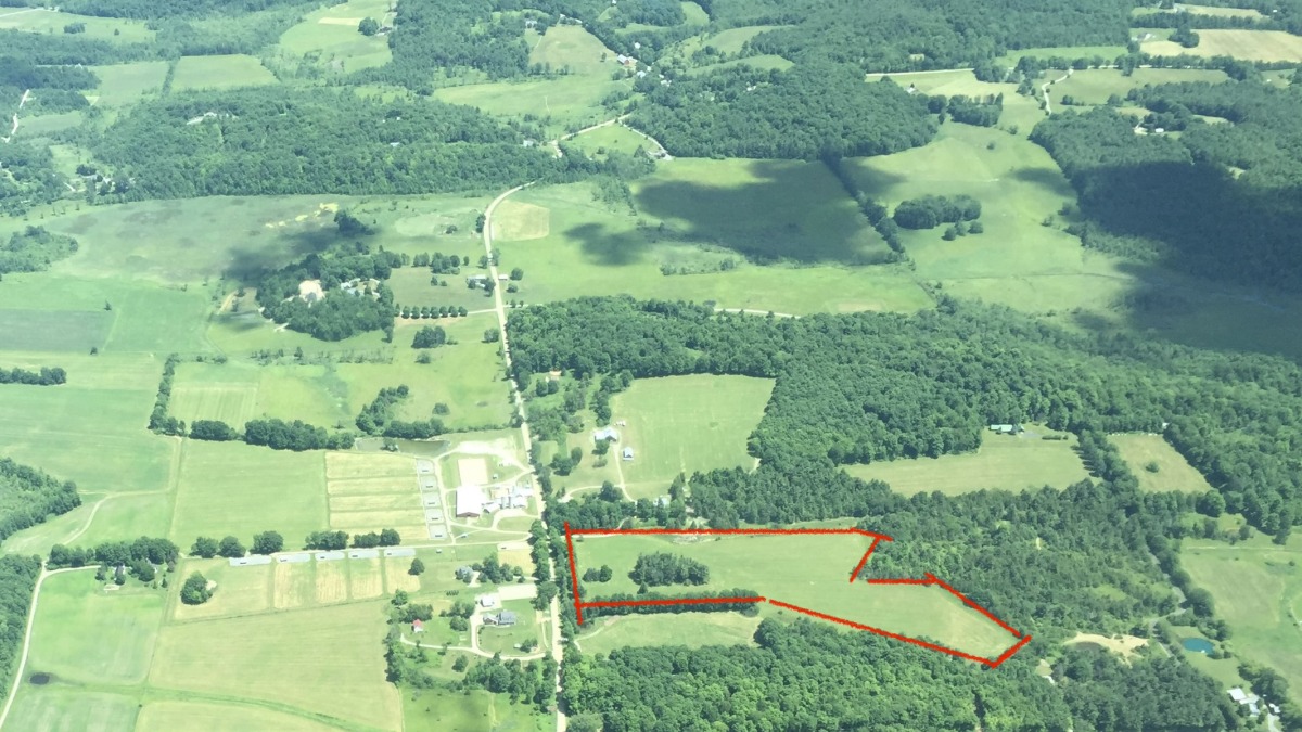 Areal picture of farm - land for lease outlined in red.