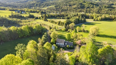 home and surrounding land
