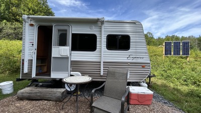 Camper seasonal abode for land steward(s)