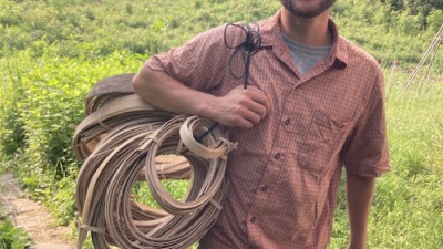Landon with basket weaving material