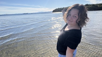 Emma wading in the waters of Lake Champlain