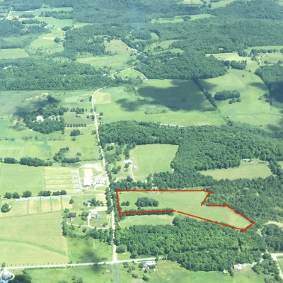 Areal picture of farm - land for lease outlined in red.